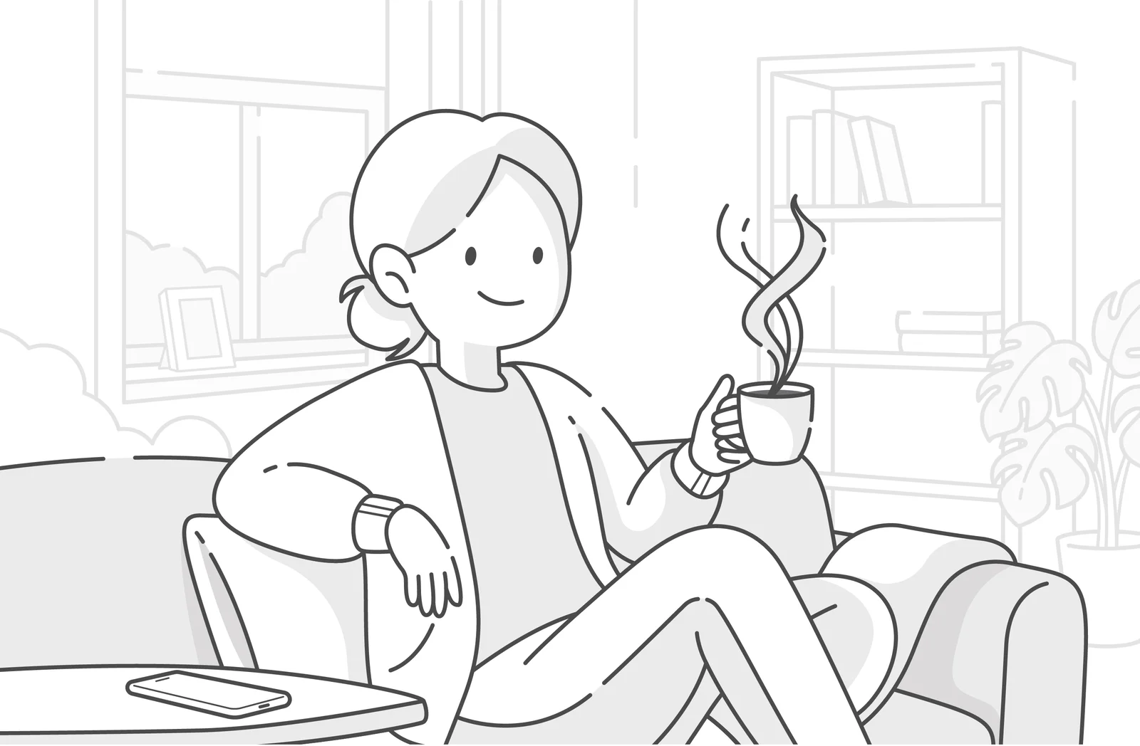 Kvinde med kaffe i sofaen, med telefonen liggende på bordet